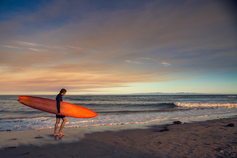 Surfer at beach.