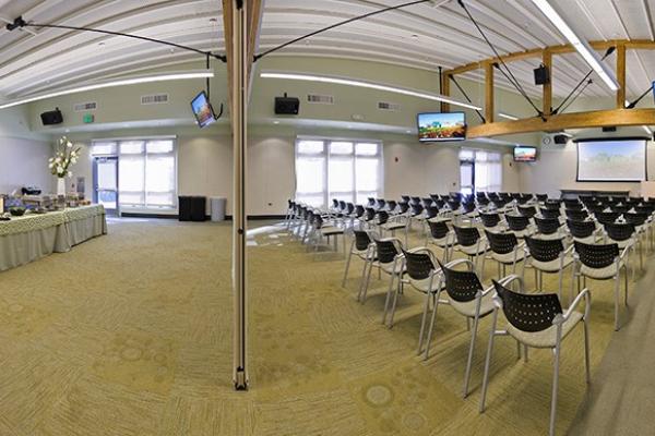 Half-room lecture setup with catering